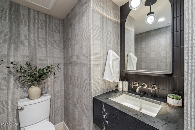 5074 Main Gore Dr S Unit B, Vail, CO 81657 - half bathroom featuring toilet and vanity