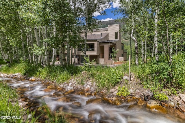 5074 Main Gore Dr S Unit B, Vail, CO 81657 - rear view of house featuring a chimney