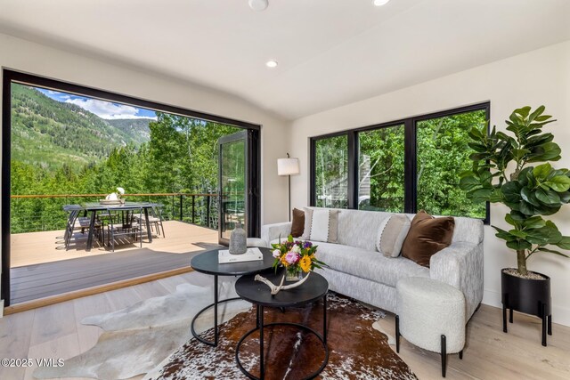 5074 Main Gore Dr S Unit B, Vail, CO 81657 - living area with vaulted ceiling, wood finished floors, and recessed lighting