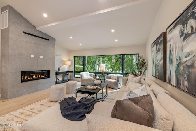 5074 Main Gore Dr S Unit B, Vail, CO 81657 - living room with wood finished floors, recessed lighting, high vaulted ceiling, and a fireplace
