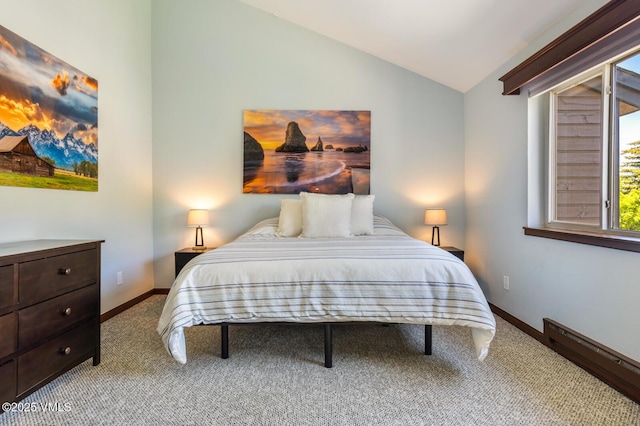 89 Columbine Cir Unit 2, Avon, CO 81620 - carpeted bedroom featuring vaulted ceiling and a baseboard radiator