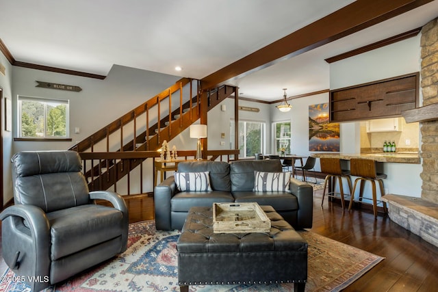 89 Columbine Cir Unit 2, Avon, CO 81620 - living room with ornamental molding, stairs, and hardwood / wood-style floors