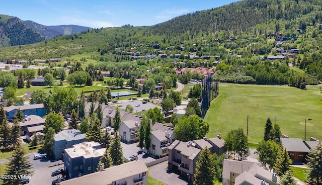 89 Columbine Cir Unit 2, Avon, CO 81620 - aerial perspective of suburban area featuring a mountainous background and a forest
