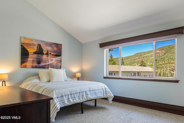 89 Columbine Cir Unit 2, Avon, CO 81620 - carpeted bedroom with baseboard heating, lofted ceiling, and a mountain view