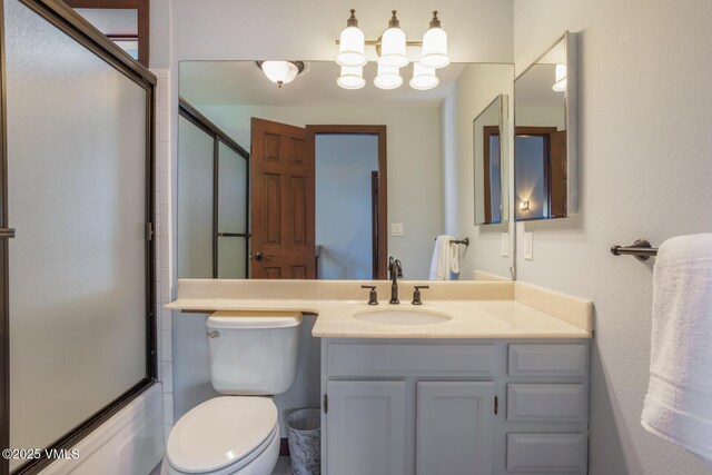 89 Columbine Cir Unit 2, Avon, CO 81620 - bathroom with vanity and combined bath / shower with glass door