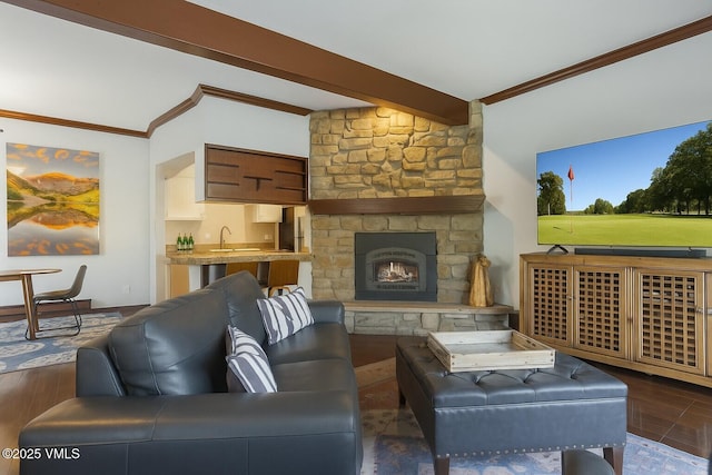 89 Columbine Cir Unit 2, Avon, CO 81620 - living area featuring ornamental molding and a fireplace