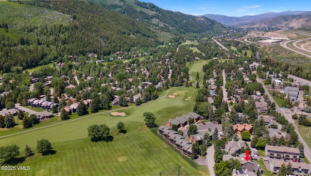 89 Columbine Cir Unit 2, Avon, CO 81620 - aerial view of property and surrounding area with a mountain backdrop, a golf course, and nearby suburban area