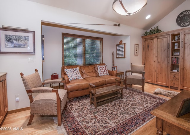 4030 Bighorn Rd Lot 1-B, Vail, CO 81657 - living room with light wood-style flooring, lofted ceiling, and baseboards