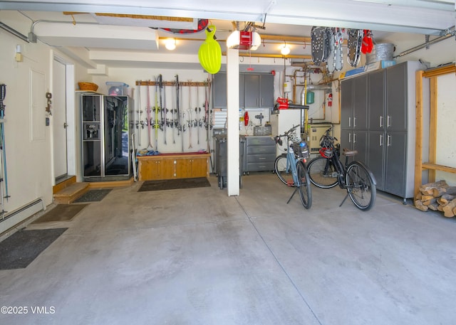 4030 Bighorn Rd Lot 1-B, Vail, CO 81657 - garage featuring a garage door opener and refrigerator with ice dispenser