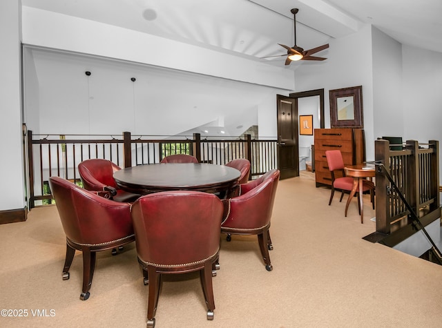 320 Hummingbird Dr Unit A201, Avon, CO 81620 - dining area with ceiling fan, carpet, and vaulted ceiling