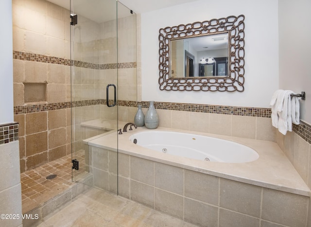 320 Hummingbird Dr Unit A201, Avon, CO 81620 - full bath featuring a stall shower and a tub with jets