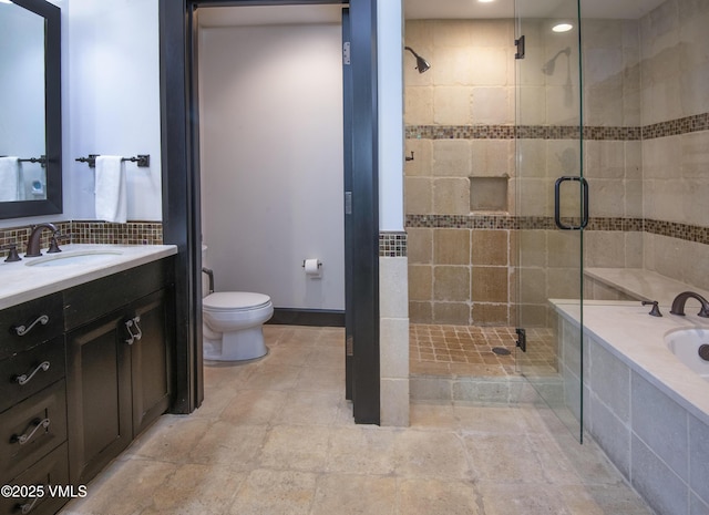 320 Hummingbird Dr Unit A201, Avon, CO 81620 - bathroom with a bath, vanity, a stall shower, recessed lighting, and tasteful backsplash