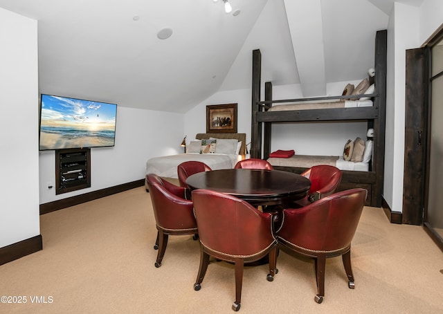 320 Hummingbird Dr Unit A201, Avon, CO 81620 - dining room with carpet floors and vaulted ceiling