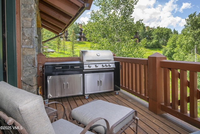 320 Hummingbird Dr Unit A201, Avon, CO 81620 - wooden deck with area for grilling
