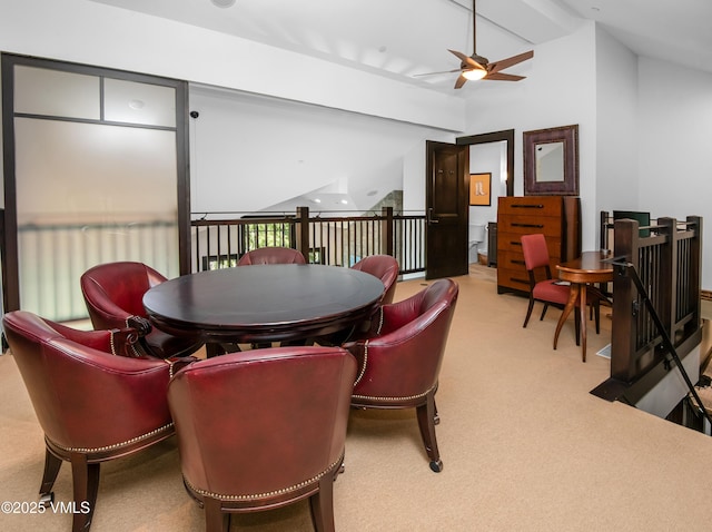 320 Hummingbird Dr Unit A201, Avon, CO 81620 - dining room featuring ceiling fan, light carpet, and vaulted ceiling