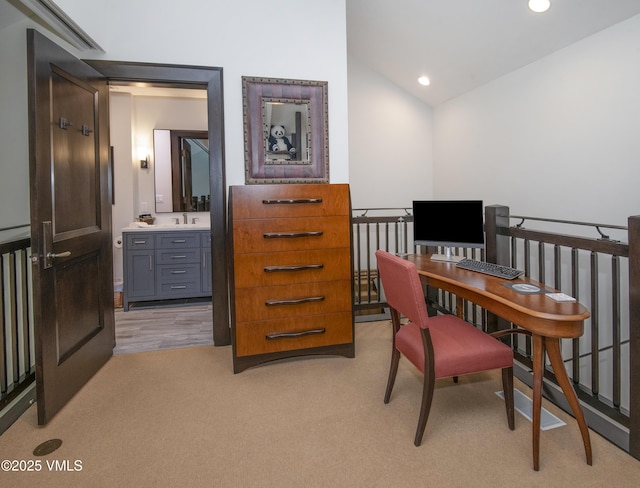 320 Hummingbird Dr Unit A201, Avon, CO 81620 - office space featuring vaulted ceiling, recessed lighting, and light carpet