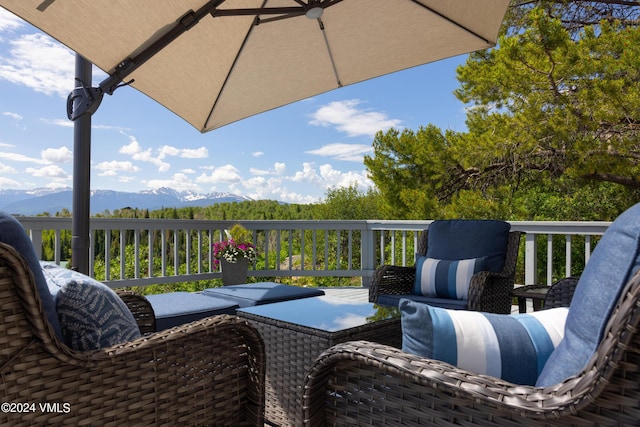 wooden terrace with a mountain view