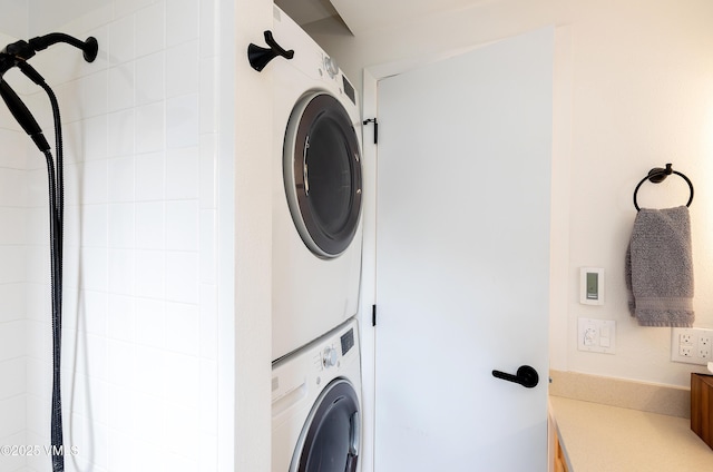 1610 Buffehr Creek Rd Unit A-22, Vail, CO 81657 - washroom featuring stacked washer / dryer