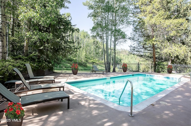 1610 Buffehr Creek Rd Unit A-22, Vail, CO 81657 - view of swimming pool featuring a patio