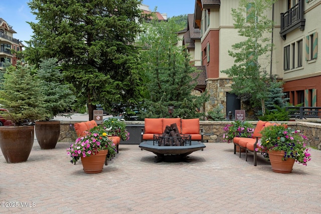 660 Lionshead Pl Unit 29, Vail, CO 81658 - view of patio / terrace featuring a fire pit