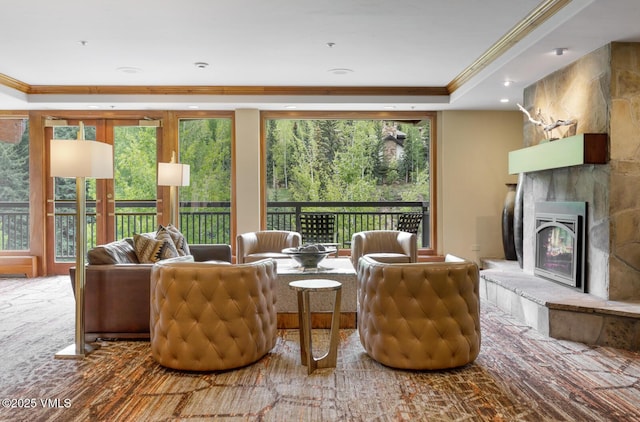 660 Lionshead Pl Unit 29, Vail, CO 81658 - living room with crown molding, a large fireplace, and recessed lighting