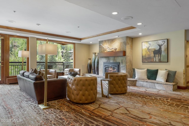 660 Lionshead Pl Unit 29, Vail, CO 81658 - living area with plenty of natural light, a fireplace, ornamental molding, recessed lighting, and a raised ceiling