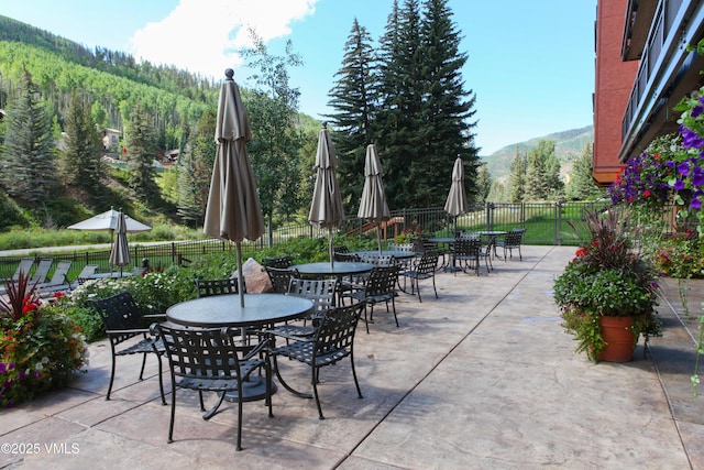 660 Lionshead Pl Unit 29, Vail, CO 81658 - view of patio featuring outdoor dining space and a mountain view