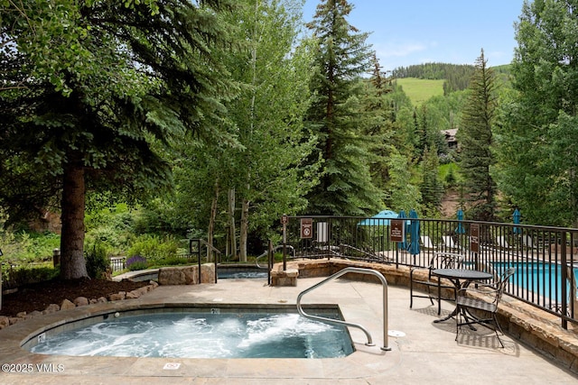 660 Lionshead Pl Unit 29, Vail, CO 81658 - community pool with a community hot tub and a patio