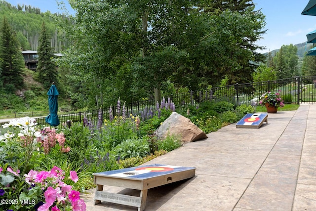 660 Lionshead Pl Unit 29, Vail, CO 81658 - view of patio with a forest view