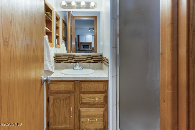 660 Lionshead Pl Unit 29, Vail, CO 81658 - bathroom with decorative backsplash, vanity, and a stall shower