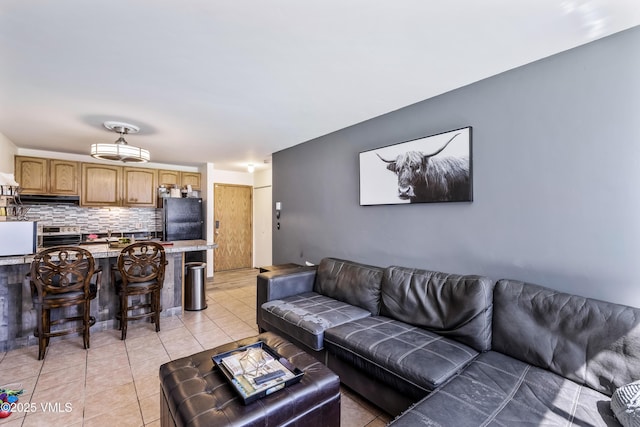 living room with light tile patterned floors