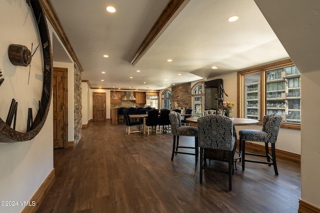 dining space featuring dark wood-type flooring