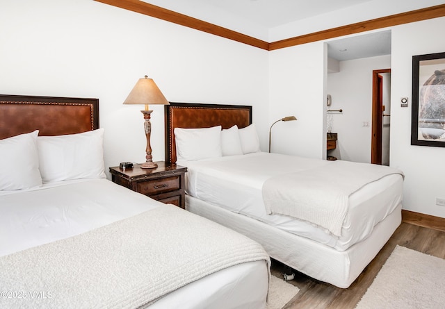 120 Offerson Rd Unit D330, Beaver Creek, CO 81620 - bedroom with wood finished floors and baseboards