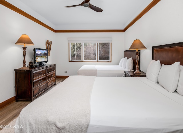 120 Offerson Rd Unit D330, Beaver Creek, CO 81620 - bedroom with baseboards, wood finished floors, ceiling fan, and crown molding