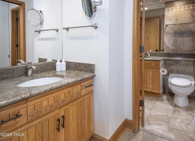 120 Offerson Rd Unit D330, Beaver Creek, CO 81620 - full bathroom with two vanities and toilet