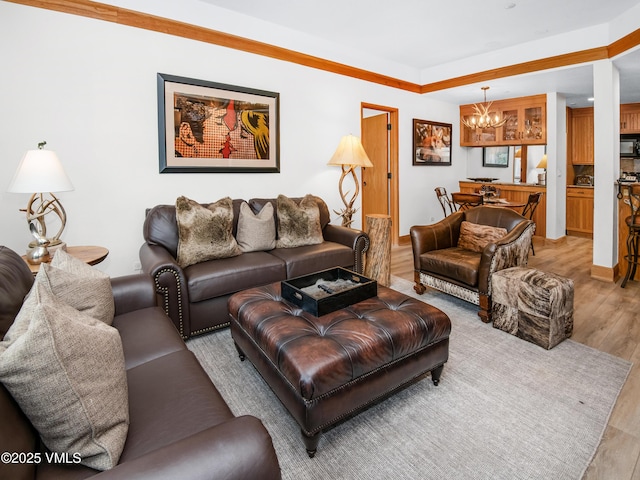 120 Offerson Rd Unit D330, Beaver Creek, CO 81620 - living room featuring light wood-style floors, a chandelier, and baseboards