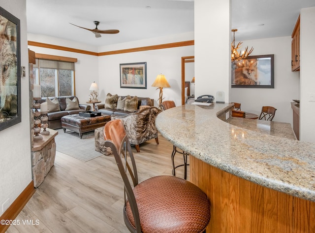 120 Offerson Rd Unit D330, Beaver Creek, CO 81620 - dining area with light wood-style floors, ceiling fan, and a chandelier