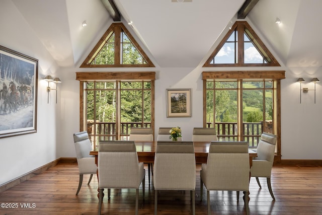 1094 Riva Gln, Vail, CO 81657 - dining area featuring beamed ceiling, wood-type flooring, and high vaulted ceiling