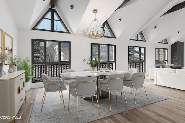 dining area featuring light wood-style floors, beam ceiling, high vaulted ceiling, and an inviting chandelier