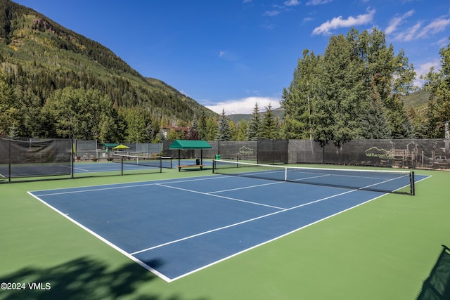 view of sport court featuring a mountain view