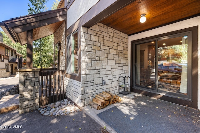 doorway to property with covered porch