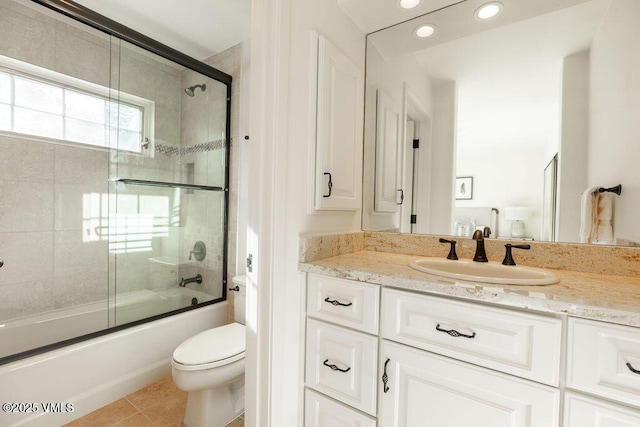 170 Wildflower Unit 12, Edwards, CO 81632 - full bathroom with vanity, tile patterned floors, bath / shower combo with glass door, and recessed lighting