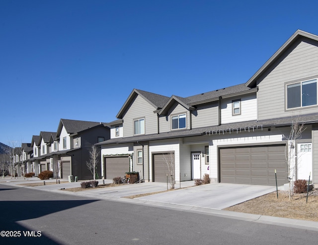 804 Chickadee Ln, Gypsum, CO 81637 - multi unit property with a garage, a residential view, and concrete driveway