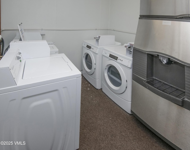 684 W Lionshead Cir Unit 215/216, Vail, CO 81657 - shared laundry featuring washing machine and dryer
