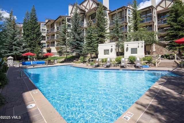 684 W Lionshead Cir Unit 215/216, Vail, CO 81657 - community pool with a patio area