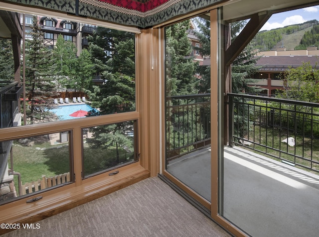 684 W Lionshead Cir Unit 215/216, Vail, CO 81657 - unfurnished sunroom featuring a mountain view