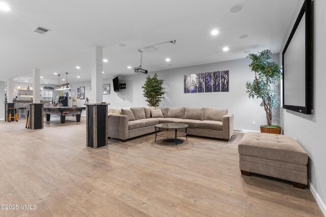 living room featuring light wood-type flooring