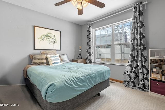 bedroom featuring ceiling fan and carpet flooring