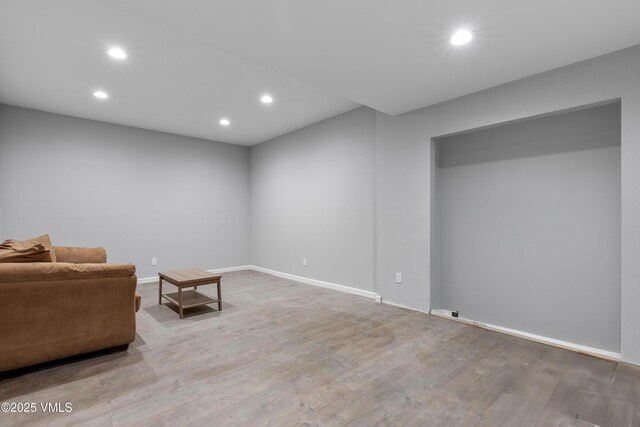 sitting room featuring light hardwood / wood-style floors