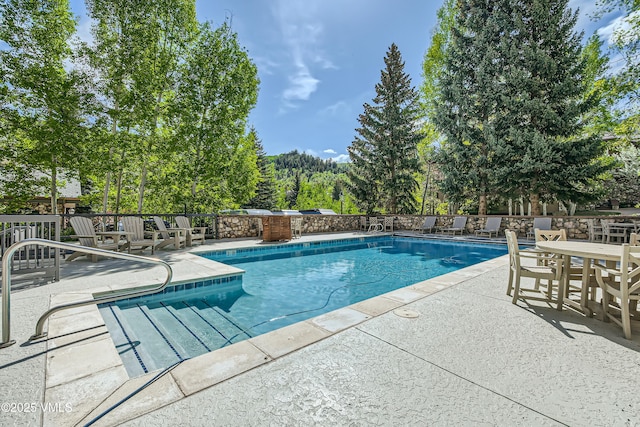 1120 Village Rd Unit 306, Beaver Creek, CO 81620 - view of swimming pool featuring a patio
